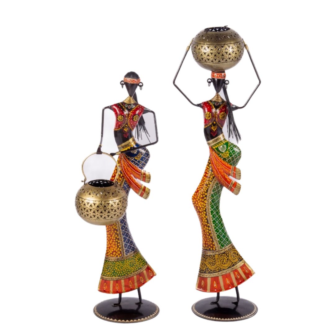  IRON DOLL WITH HANDI T LIGHT ON HAND