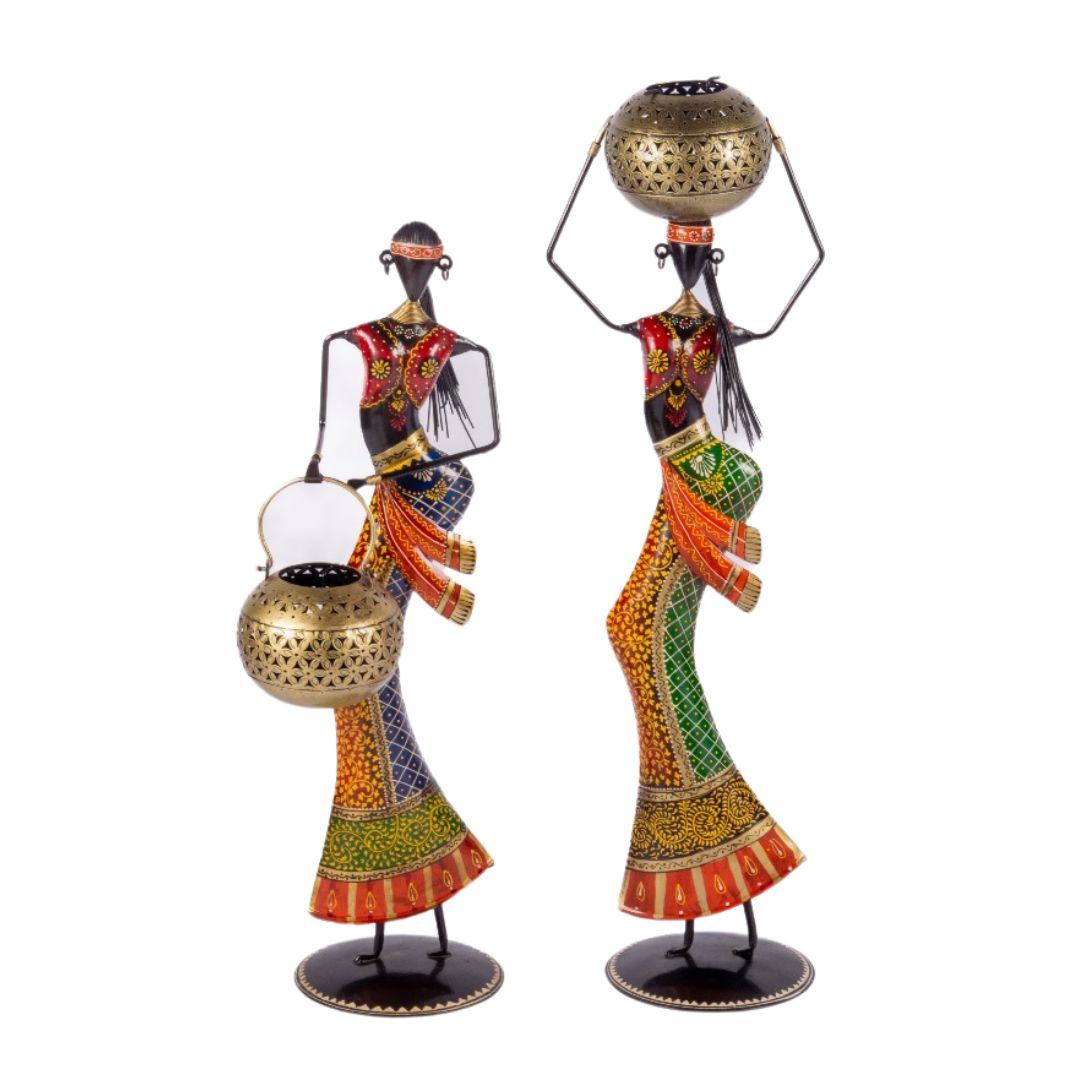  IRON DOLL WITH HANDI T LIGHT ON HAND